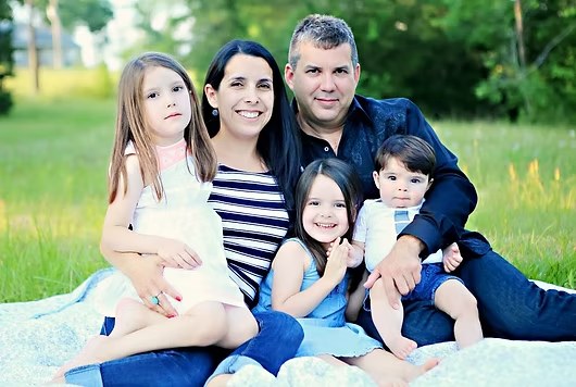Mark Harris, ISA Certified Arborist and owner of Brenham Trees, with his family